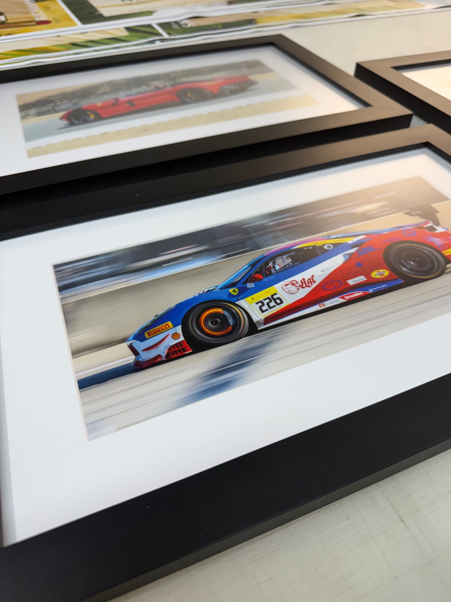 Framed panoramic print of a racing Ferrari