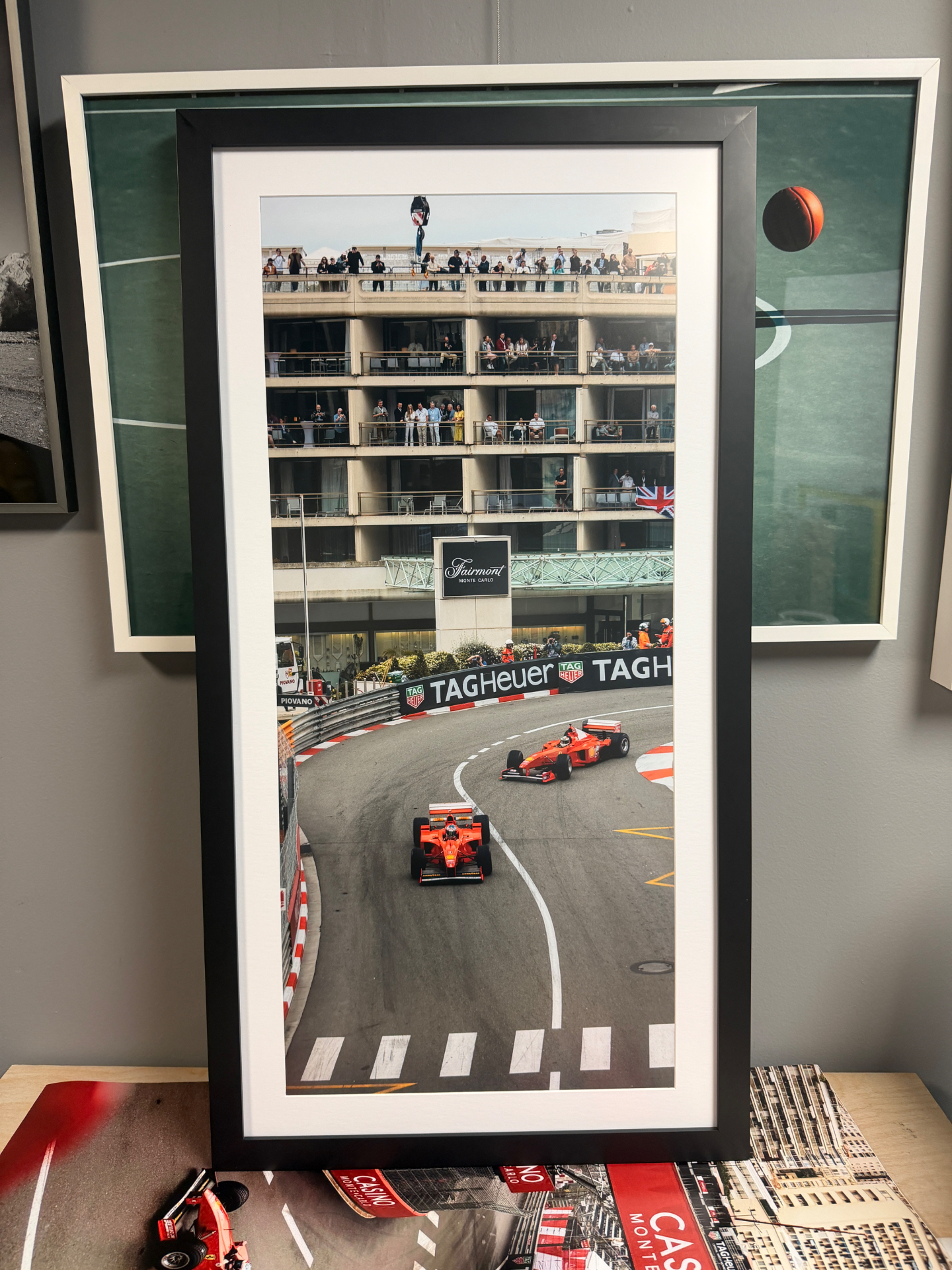 Framed print of two Ferrari F1 cars at the Fairmont hairpin